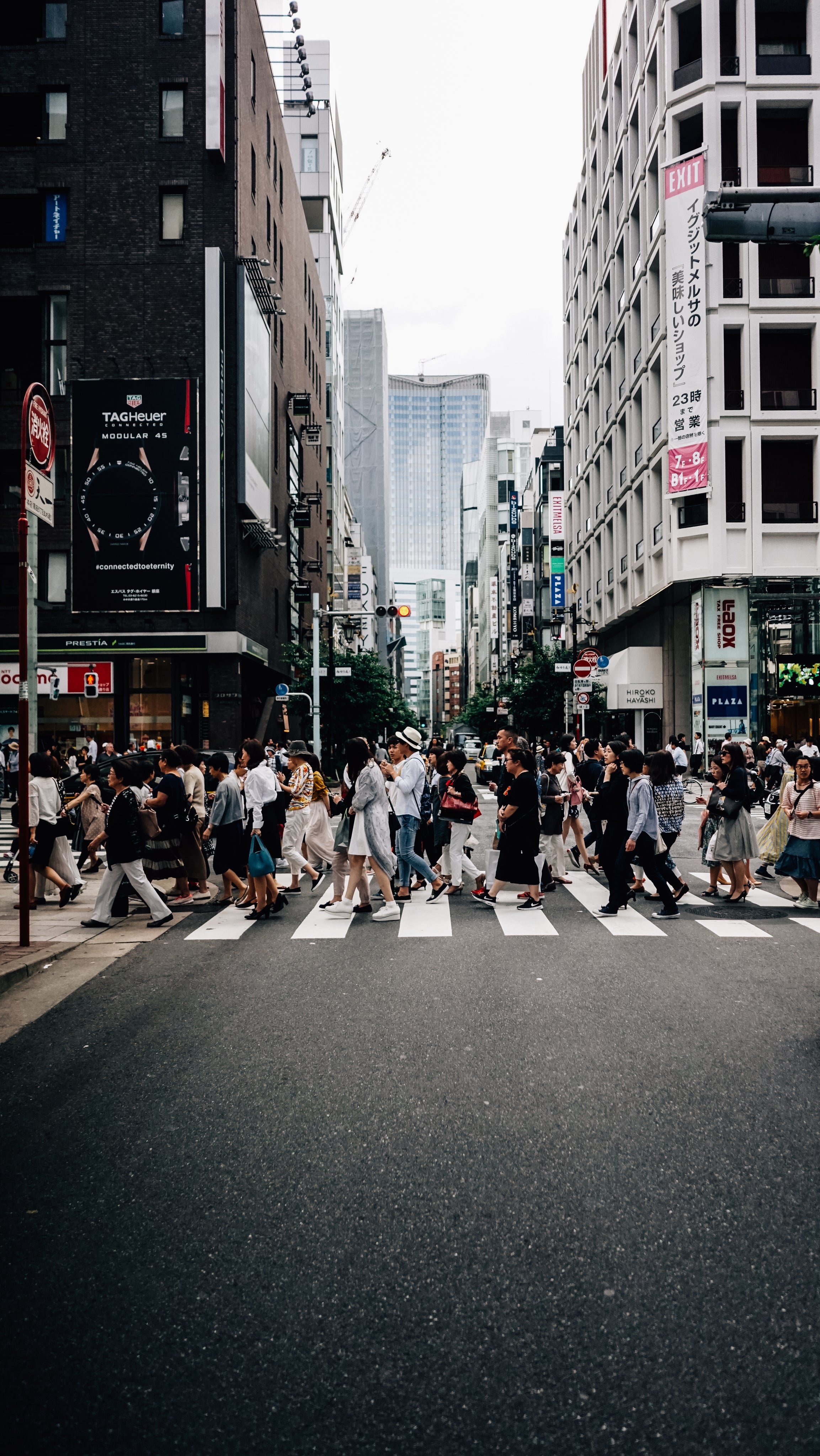 Lifestyle image busy crossing in japanese side street